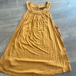 Cable and gauge yellow/gold tank